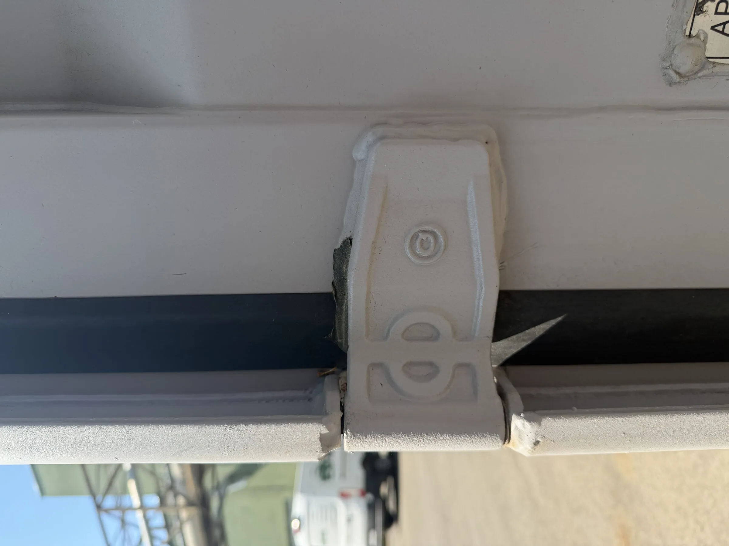Door locking mechanism on a resort container