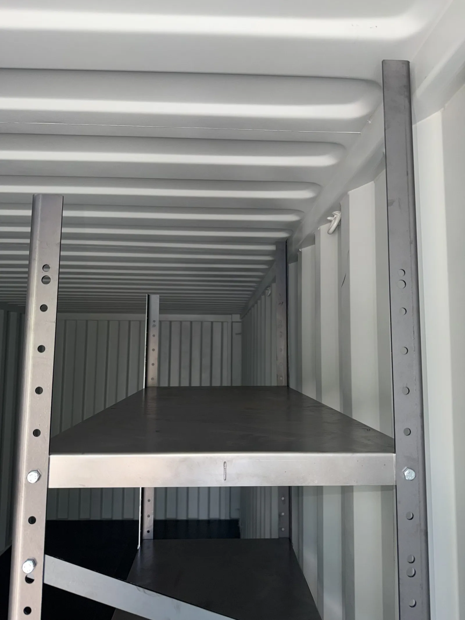 Interior shelving and storage in a resort container