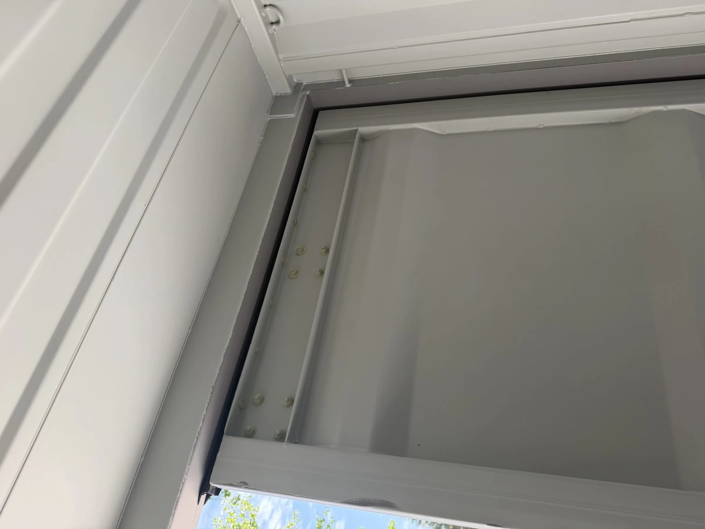 Interior corner of a white resort container