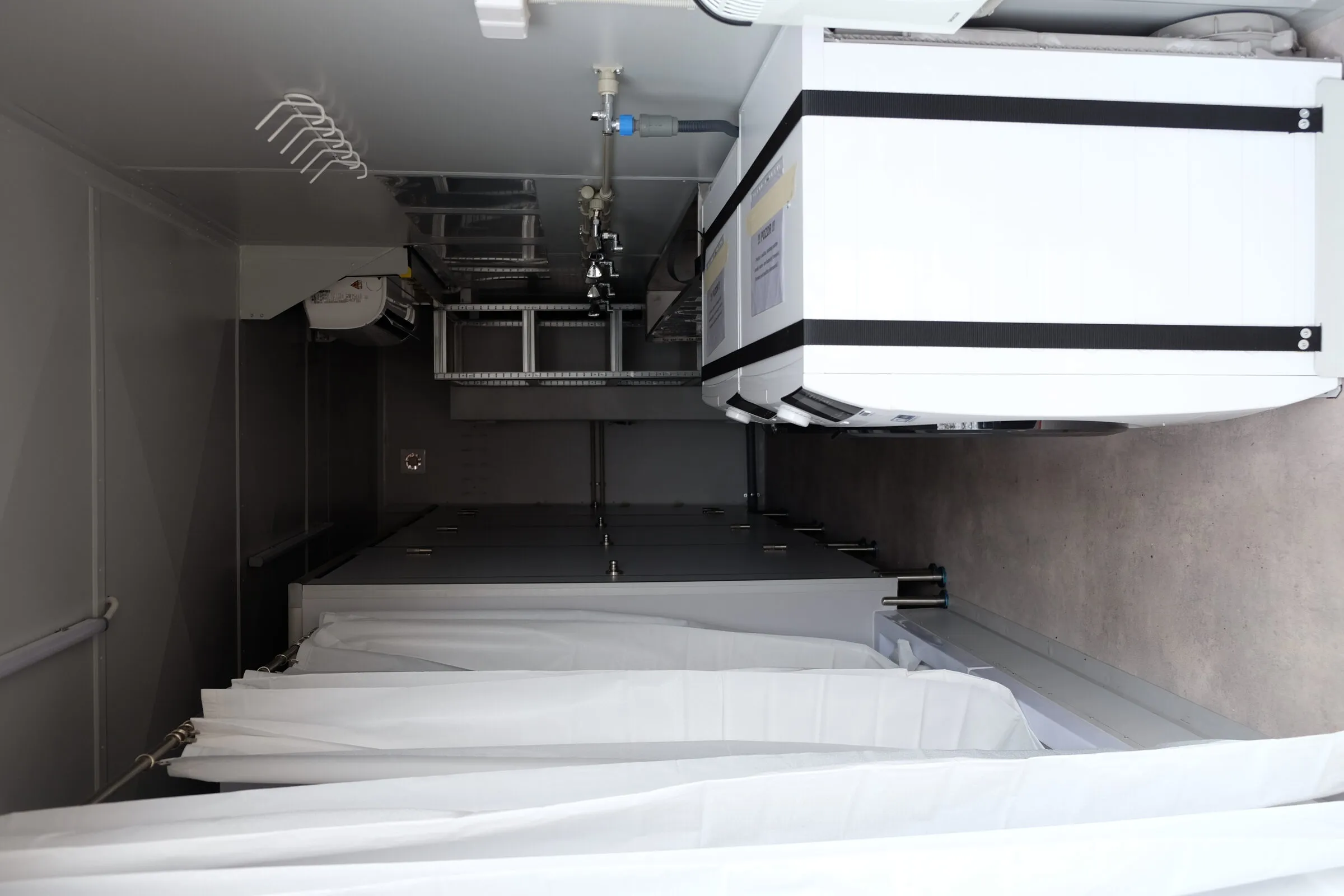 Washing machine inside a sanitary module