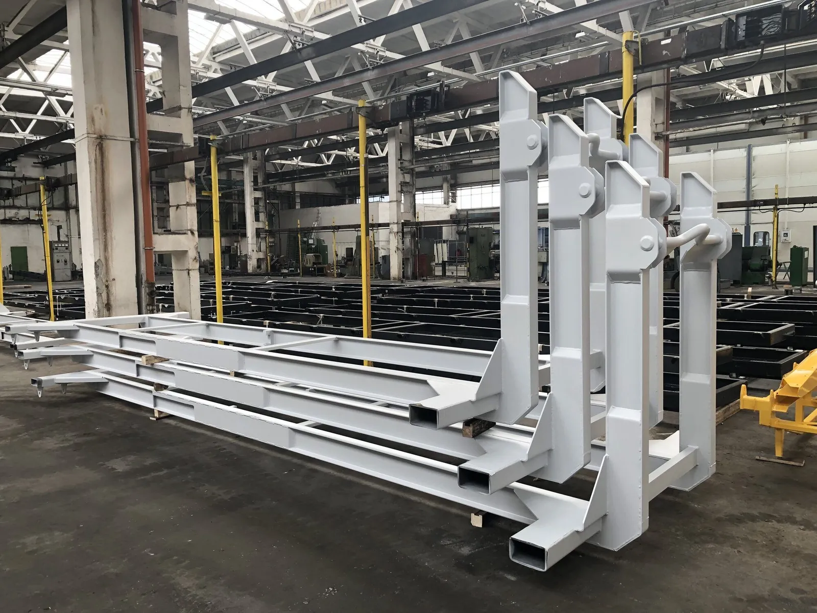 Second view of steel components staged for fabrication