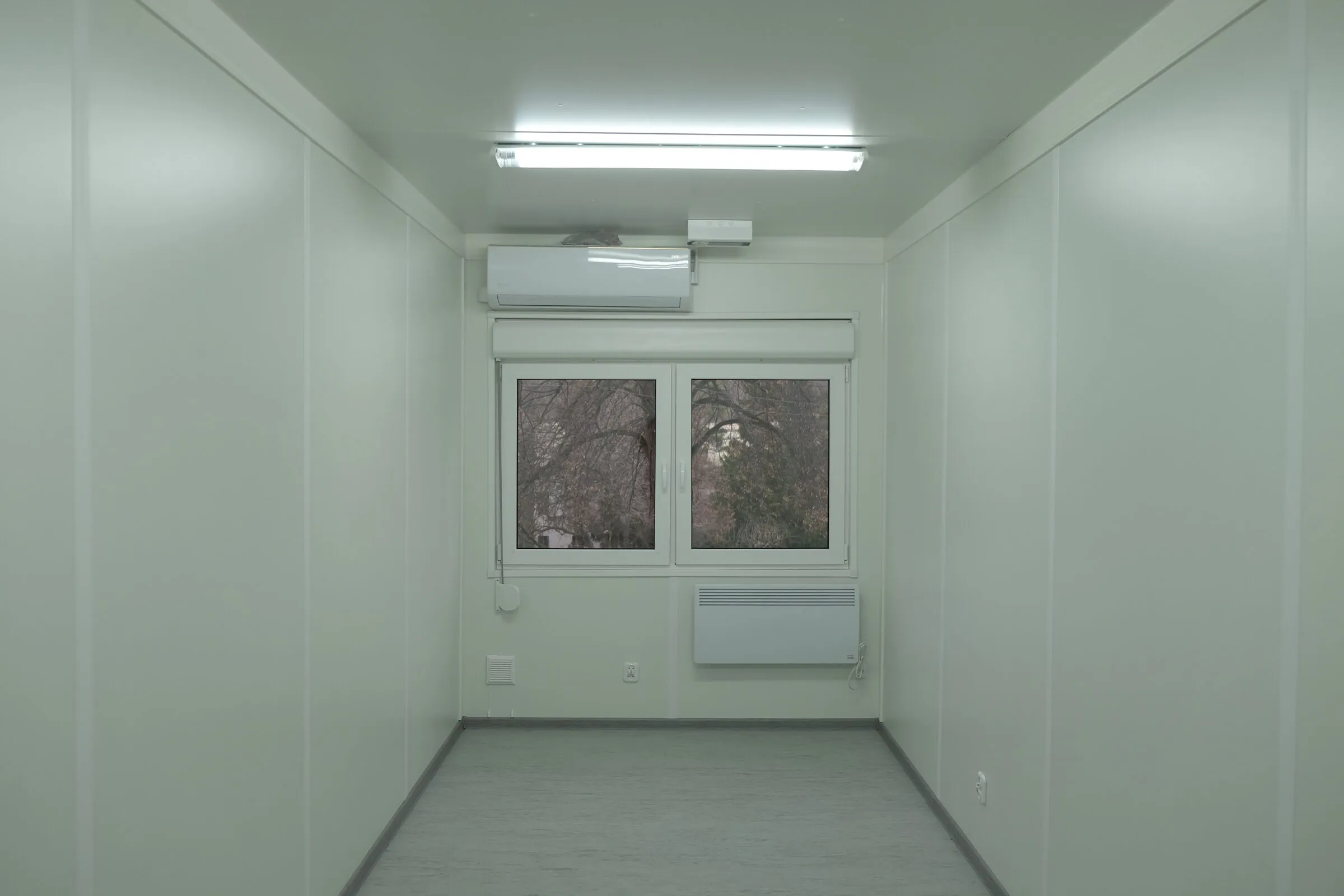Module interior with window and fluorescent lighting